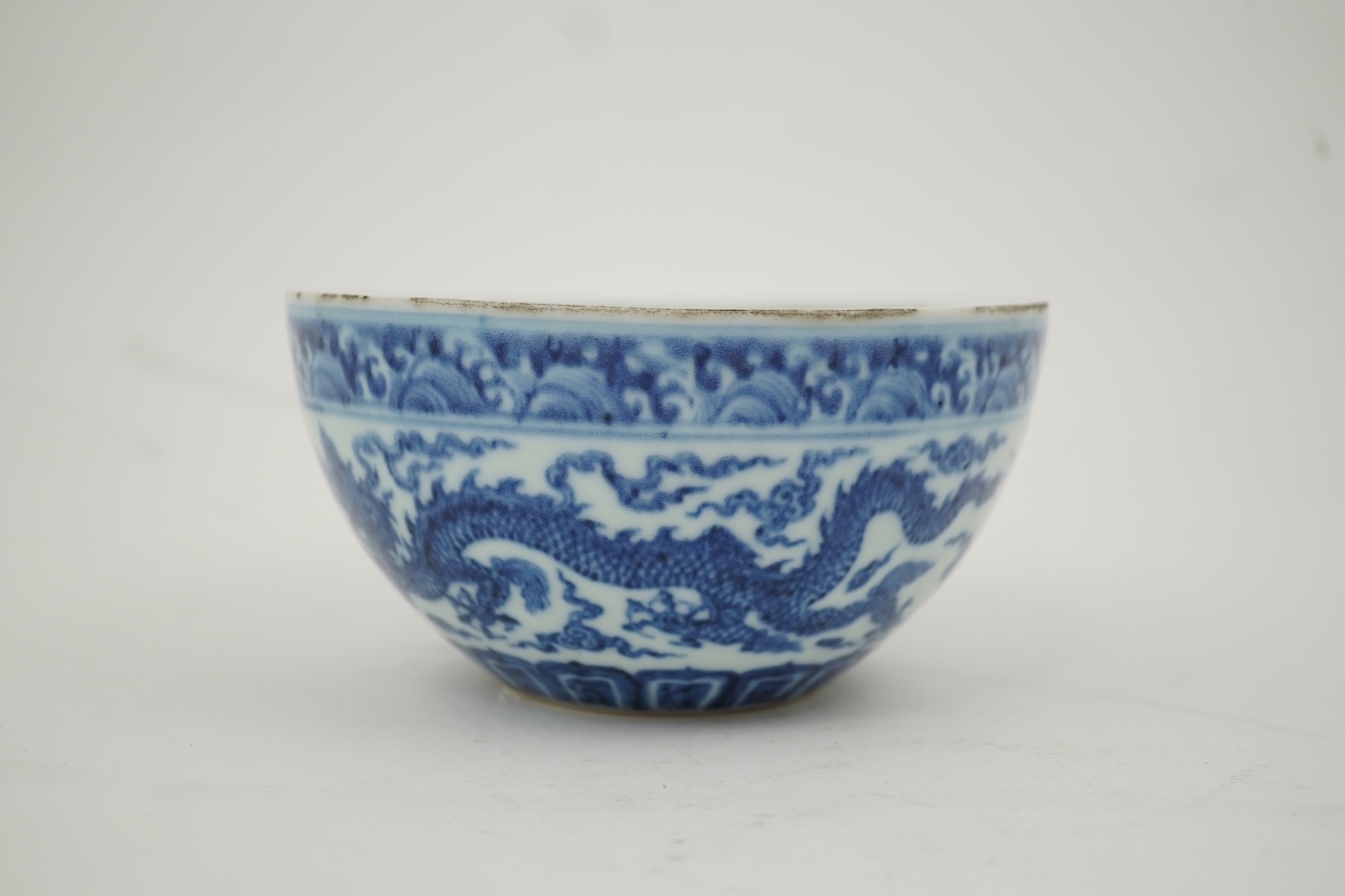 A Chinese blue and white ‘dragon’ dice bowl, Xuande mark, probably late Qing dynasty